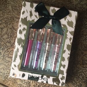 NEW BEBE 4 lip gloss set